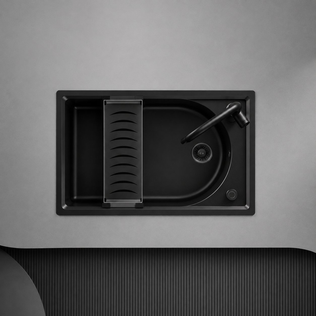 Carysil granite kitchen sink with drainer, set into a stone worktop