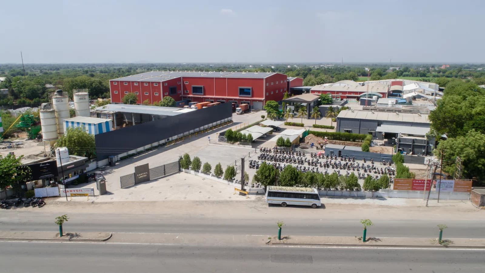 Aerial view of the Carysil manufacturing plant with rooftop solar arrays